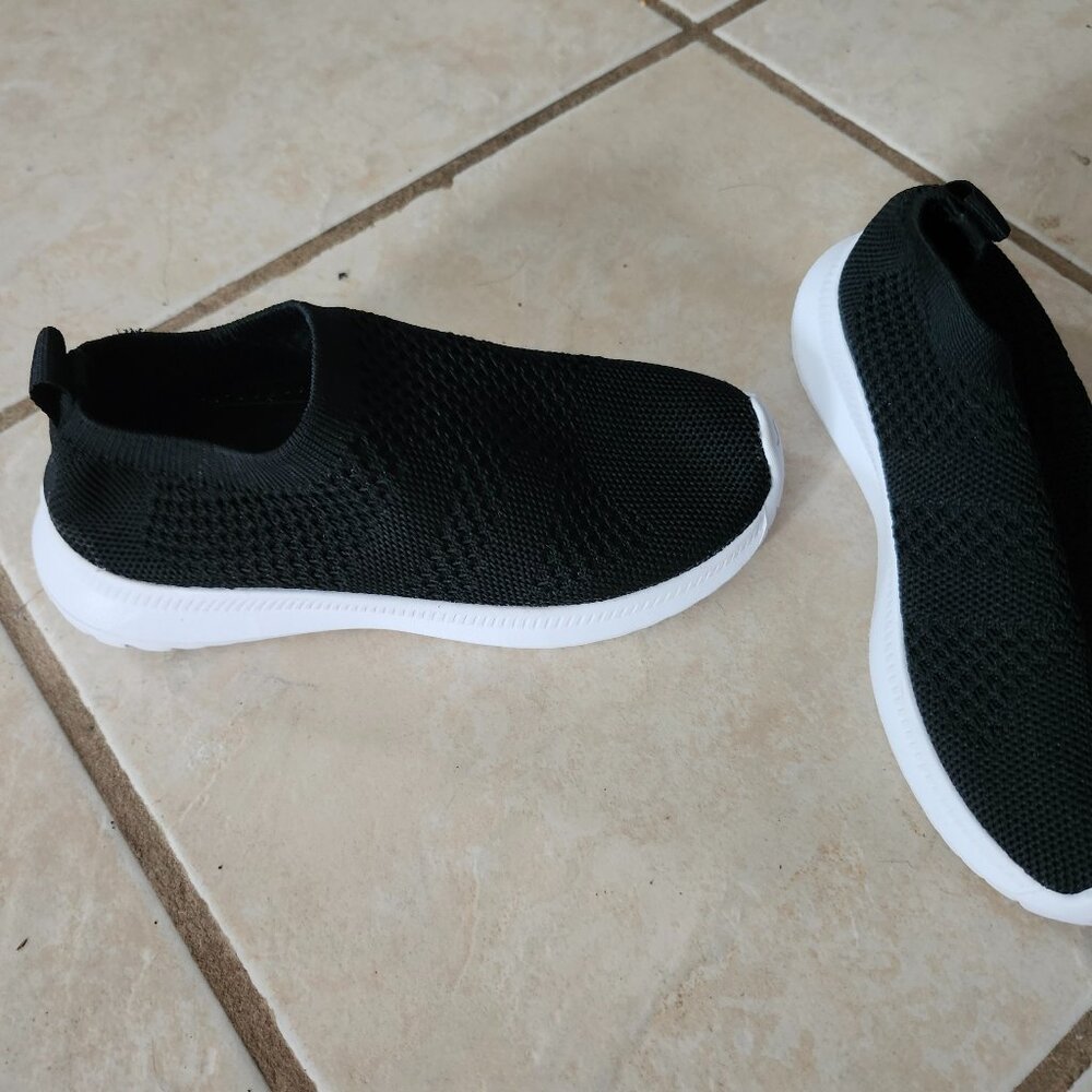Black pull on sneakers